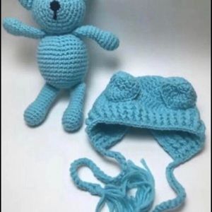 Amigurumi handknitted teddy bear and hat